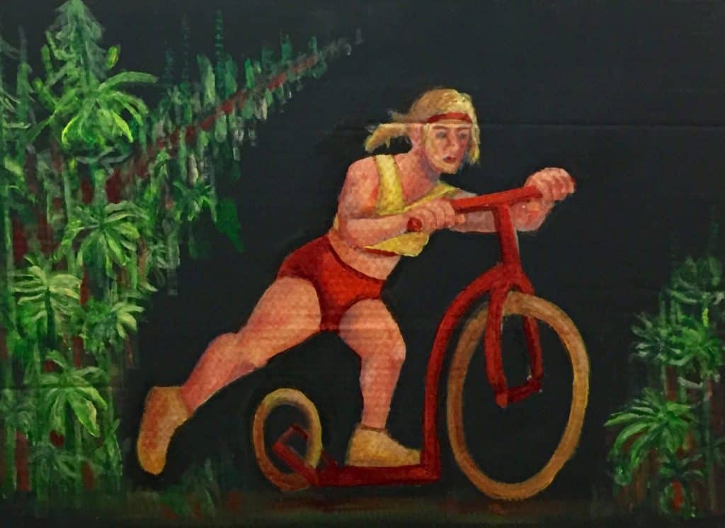 woman riding a large kick bike in a cannabis field